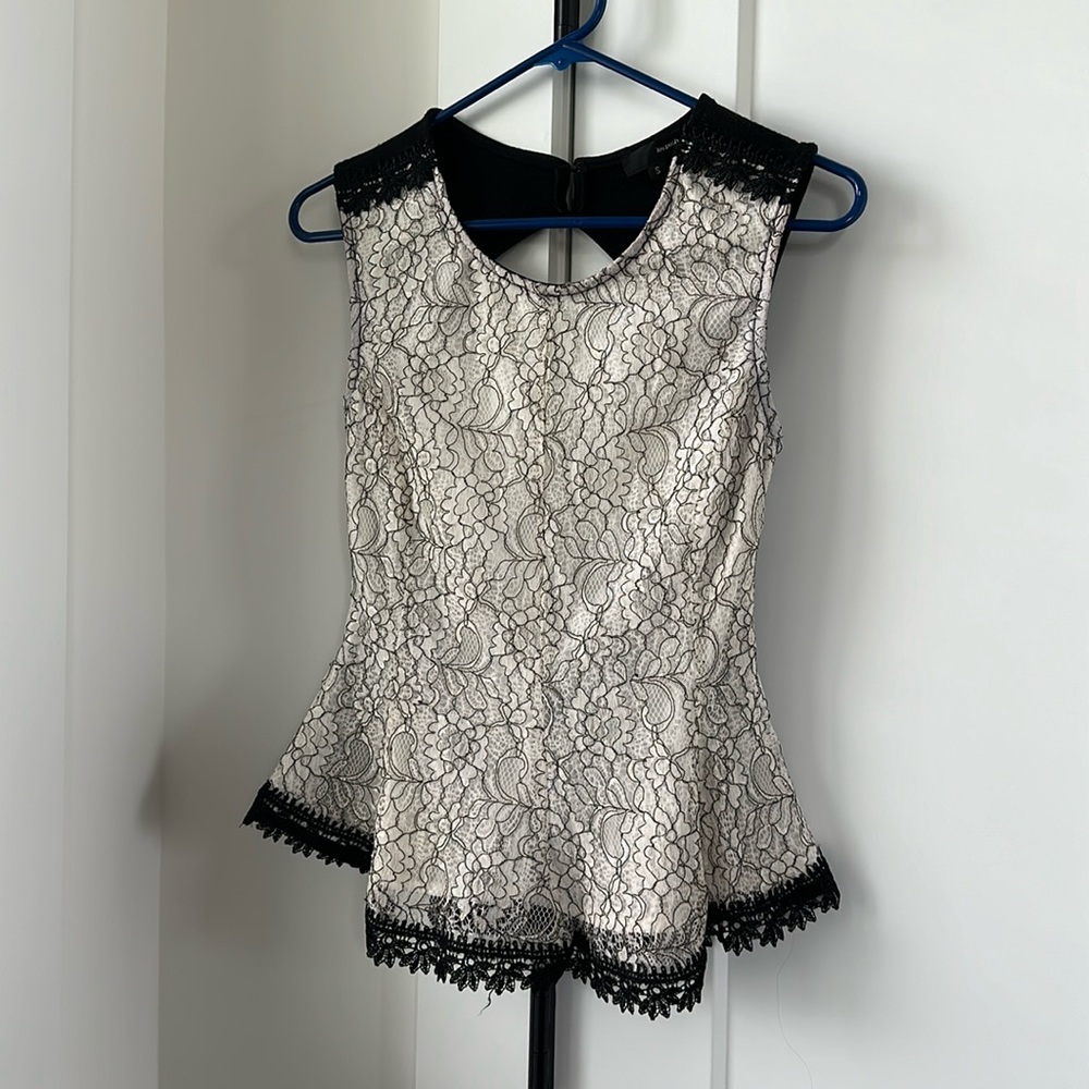 Black and white lace peplum top